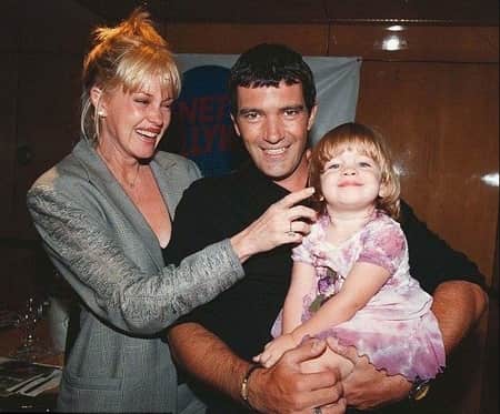 Stella with her father and mother